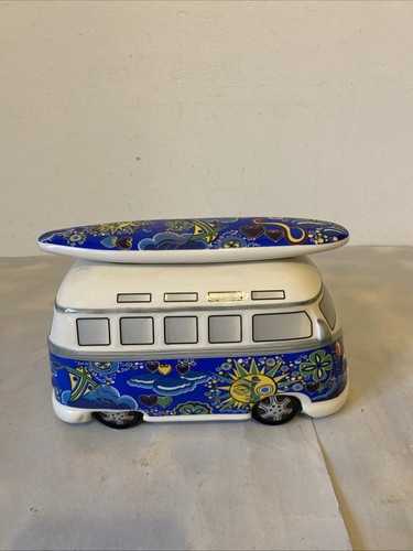 Camper van with - with, surfboard