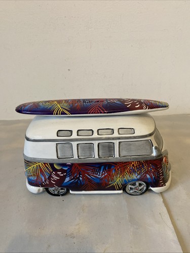 Camper van with - with, surfboard